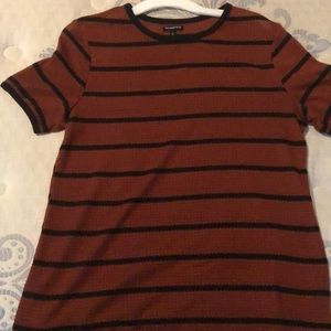 Cute Knit black and orange top. size large